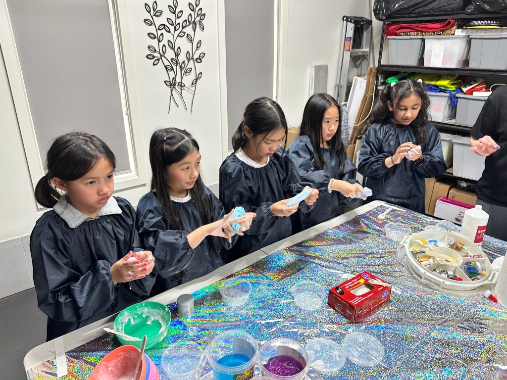 girls making slime