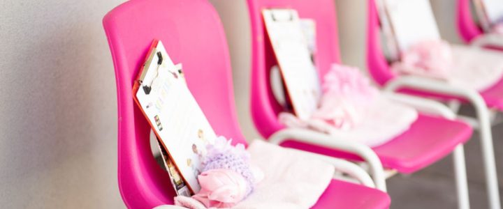pink chair with robes and pamper things