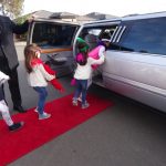 girls entering hummer limo