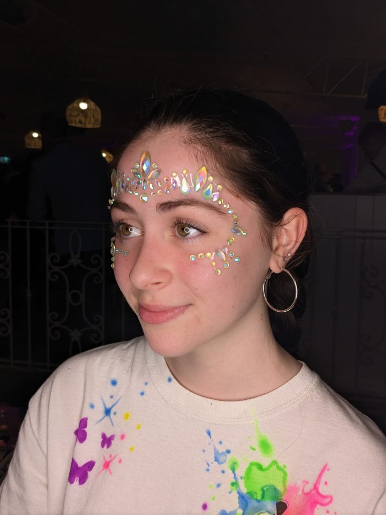 girl with beautiful face painting and face art