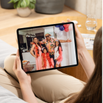 A woman watching a family photo