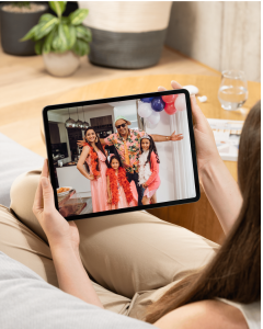 A woman watching a family photo