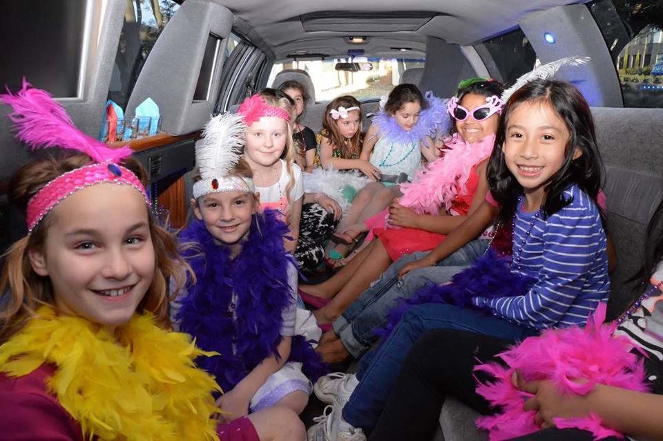 dressed up girls in limo