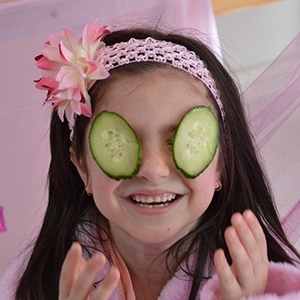 girl with cucumber eyes spa pamper party